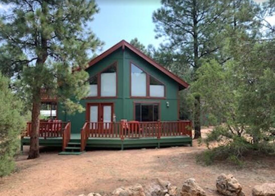 Peaceful family cabin in the woods with miles of trails and stocked lakes nearby