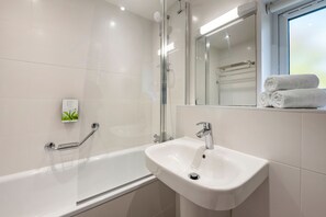 Hair dryer, towels, soap, shampoo