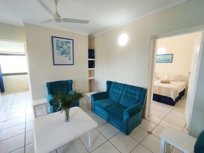 Comfort Apartment, 2 Bedrooms, Partial Sea View, Garden Area | Living area | 32-inch TV with cable channels - All the Tides - Lo Tide (Margate)