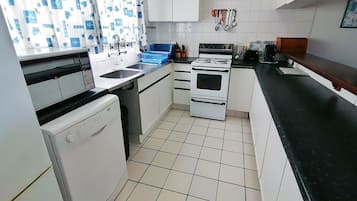 Apartment, 2 Bedrooms | Private kitchen | Full-size fridge, microwave, oven, stovetop