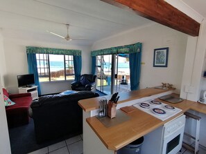 House, 1 Bedroom | Living room | 32-inch flat-screen TV with satellite channels, TV
