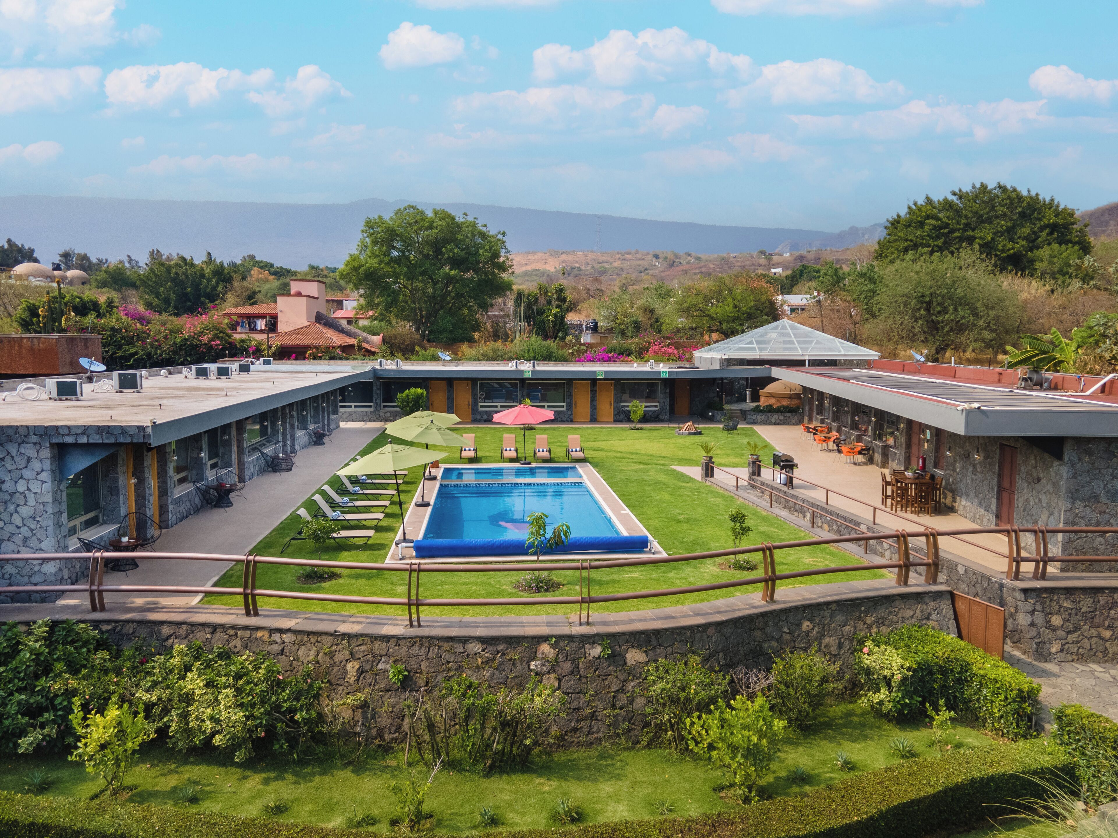 Outdoor pool, pool umbrellas, sun loungers