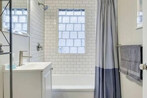 Bathtub, hair dryer, towels, soap - Walk to Falls / Close to Everything / Fenced Backyard (Minneapolis)
