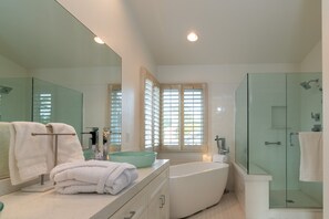 Combined shower/tub, hair dryer, towels, soap