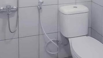 Double Room | Bathroom | Shower, free toiletries, towels