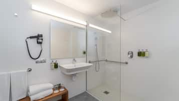 City Studio | Bathroom | Shower, hair dryer, towels, soap