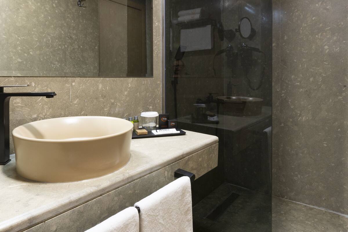 standard double or twin room | bathroom | hair dryer, slippers, bidet, towels