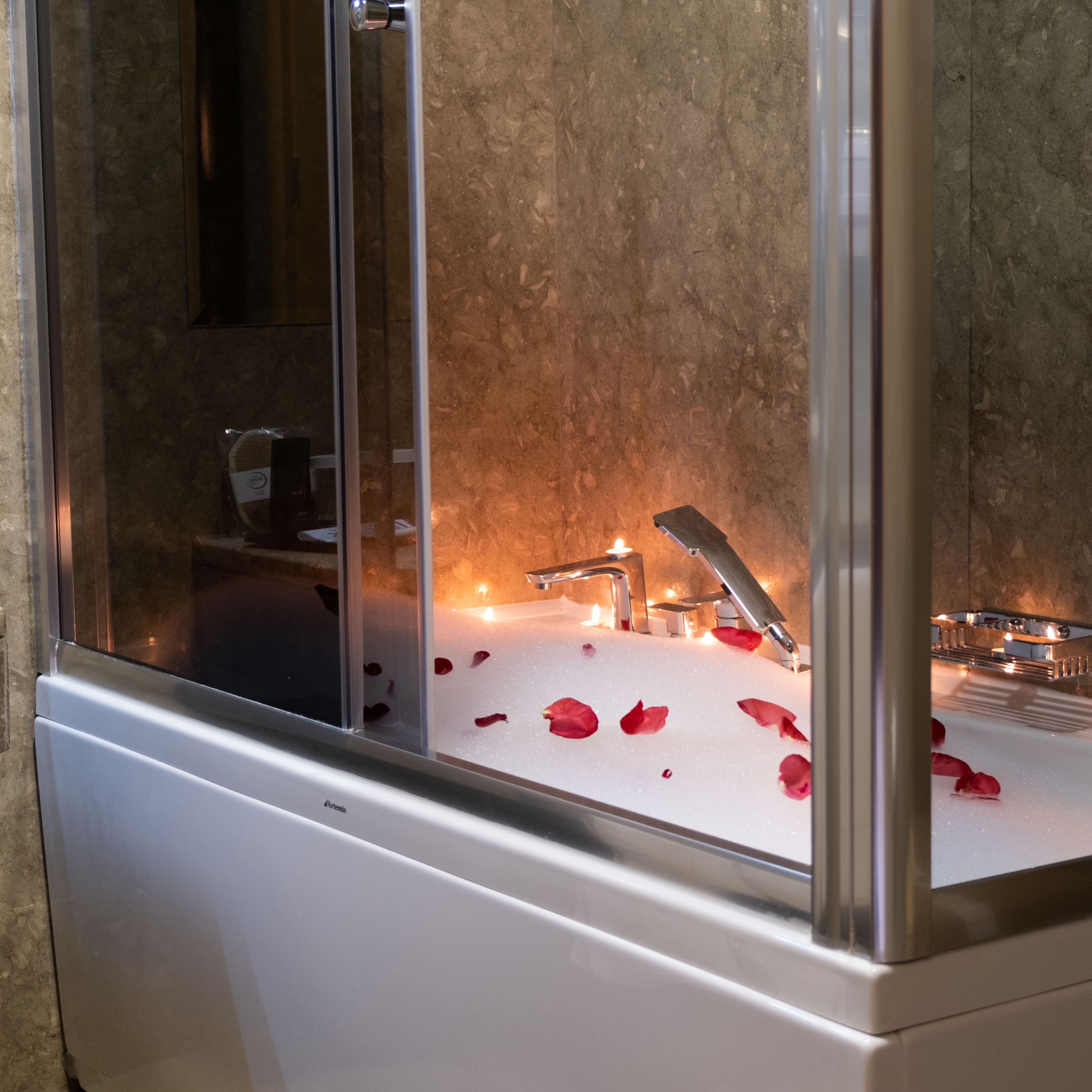 hair dryer, slippers, bidet, towels