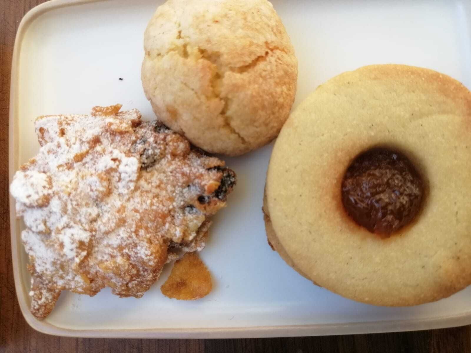 A plate with three different types of pastries.