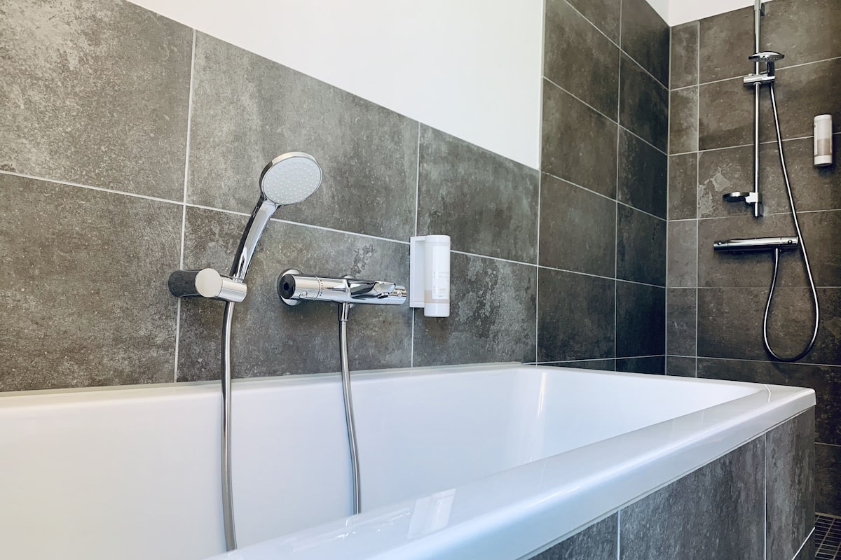 family suite | bathroom | hair dryer, towels