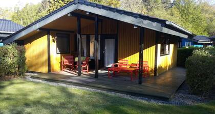Pure relaxation right by the forest & only 750m to the beach in our retro chalet