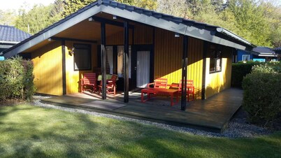 Pure relaxation right by the forest & only 750m to the beach in our retro chalet