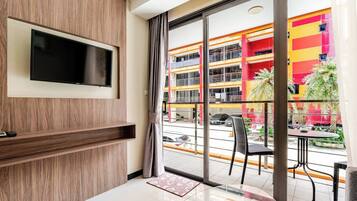 1 Bedroom Building View | Premium bedding, in-room safe, blackout drapes, iron/ironing board