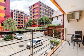 1 Bedroom Building View | Premium bedding, in-room safe, blackout drapes, iron/ironing board