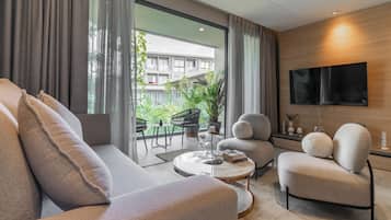 Elite Apartment | Ruang tamu | TV skrin rata