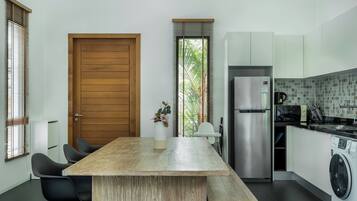 3 Bedrooms | Private kitchen | Full-sized fridge, microwave, stovetop, coffee/tea maker