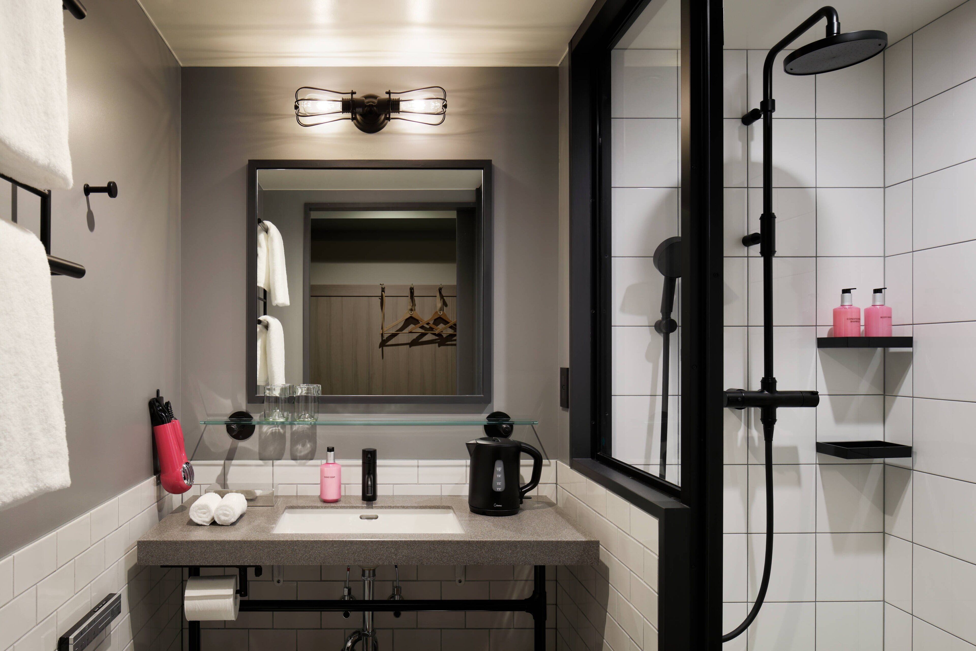 shower, hair dryer, slippers, electronic bidet