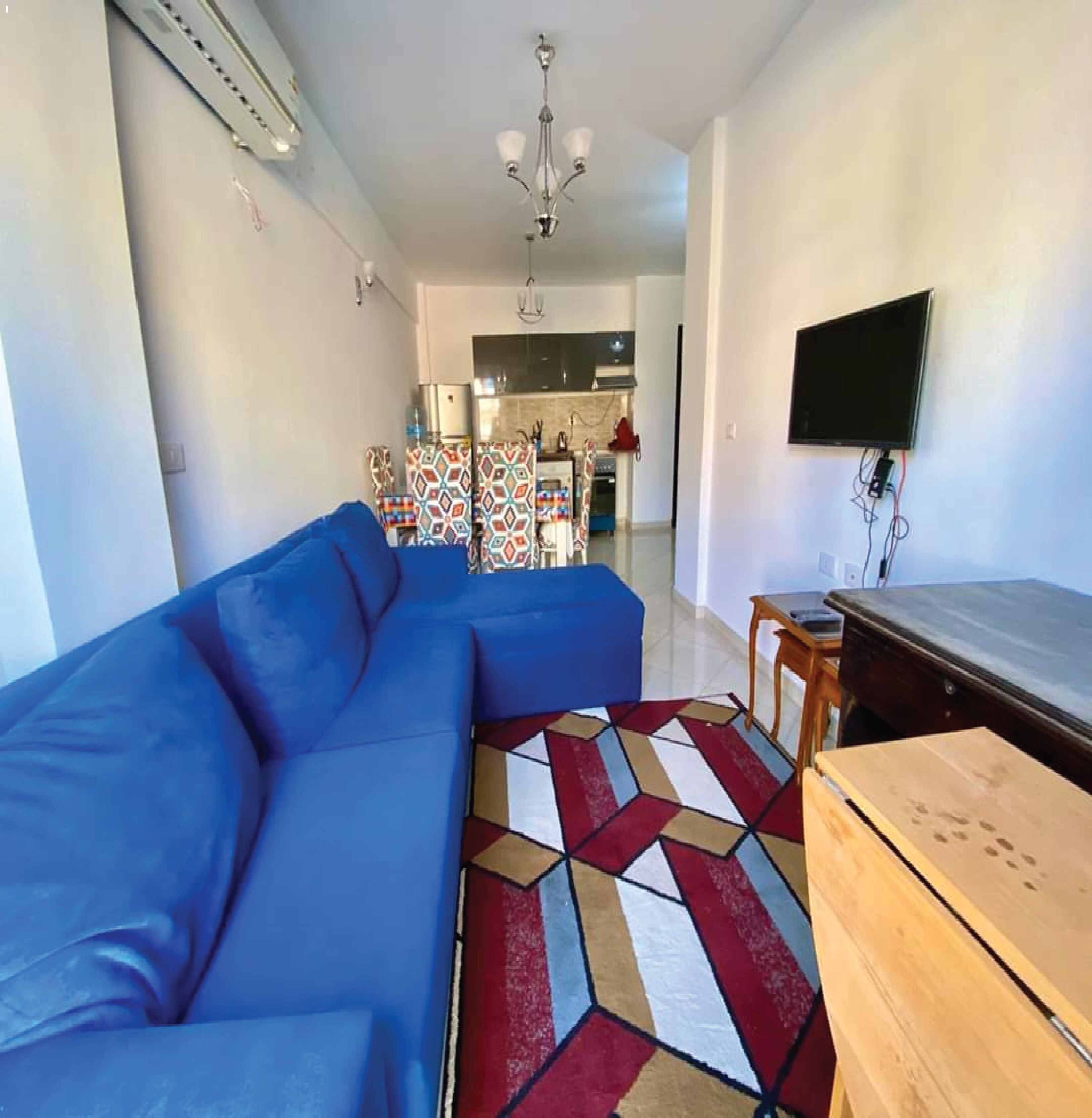 Deluxe Apartment | Living area | 32-inch LCD TV with satellite channels, TV