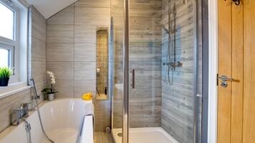 Bathtub, hair dryer, towels