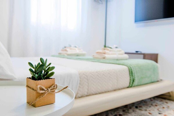 1 slaapkamer, een strijkplank/strijkijzer, wifi