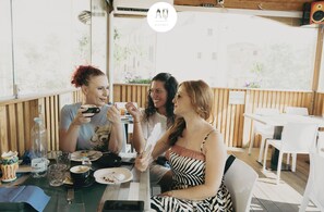 A restaurant with wooden paneling and white tables. - Cielo D'Alcamo center - Jester (Alcamo)