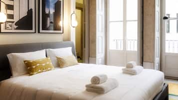 Suíte estúdio luxo, vista para o jardim | 1 quarto, roupas de cama premium, cortinas blackout