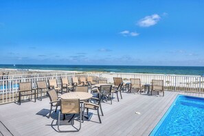 Outdoor dining - 🥳 Early Bird Sale. Diamond. 10BR. Extraordinary beachfront home. Elevator. Deck Pool. More! (Orange Beach)