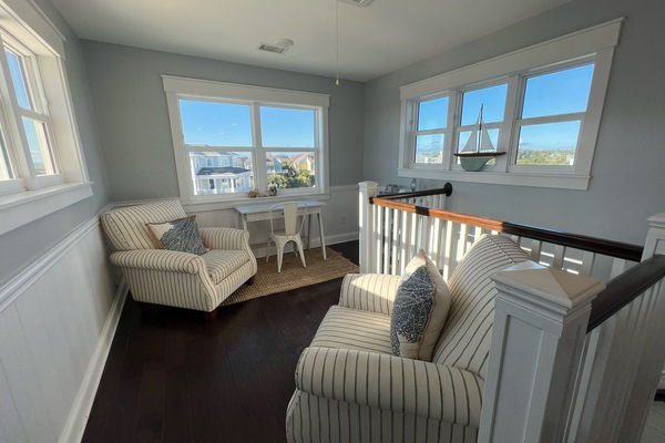 Televisor intel·ligent, reproductor de DVD, llibres i videoteca