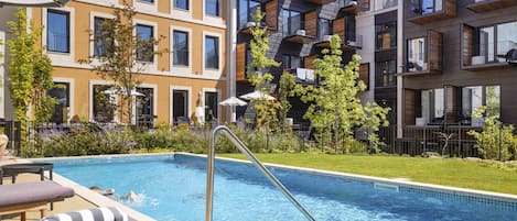 Outdoor pool, pool umbrellas, pool loungers