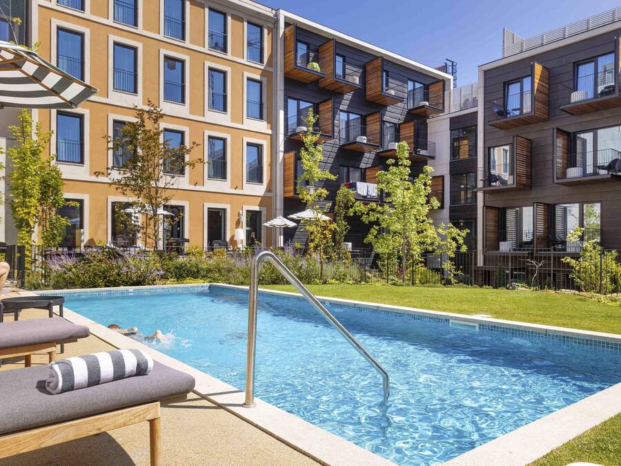 Outdoor pool, pool umbrellas, sun loungers