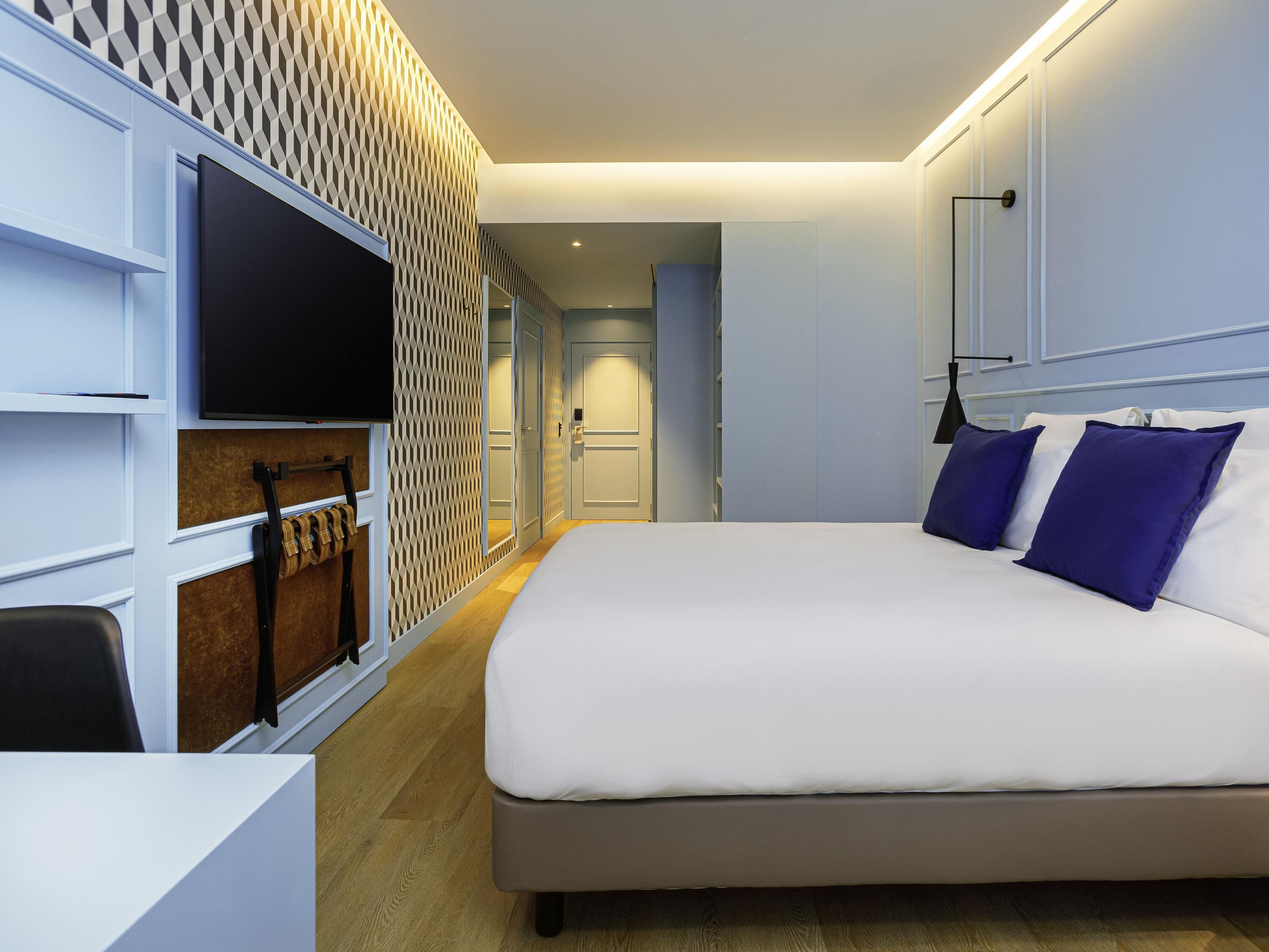 Habitación clásica, 1 cama doble | Minibar, escritorio, cortinas opacas y sistema de insonorización