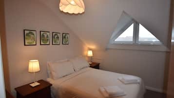 Departamento, 3 habitaciones | Ropa de cama
