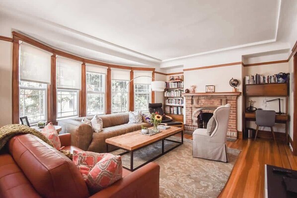 TV, fireplace, books, offices