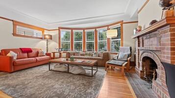 TV, fireplace, books, offices