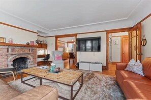 TV, fireplace, books, offices