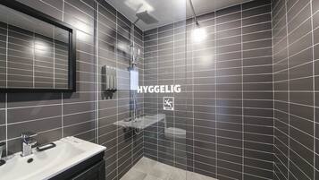 Royal Penthouse | Bathroom | Shower, slippers, towels, soap