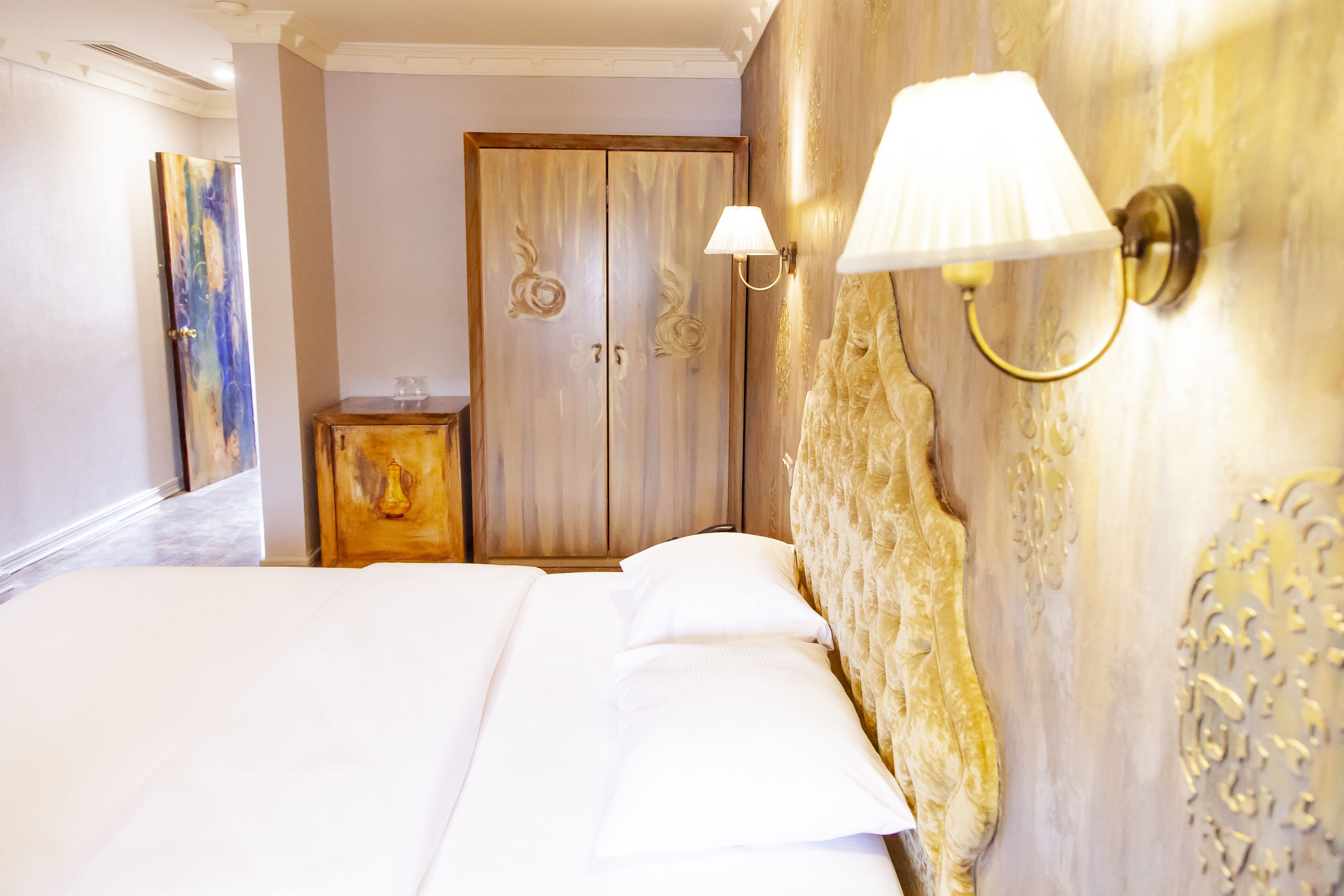 deluxe room | premium bedding, minibar, desk, laptop workspace