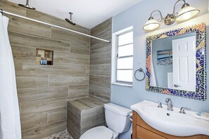 Bathtub, hair dryer, towels, soap