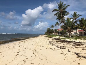 On the beach, sun-loungers, beach towels