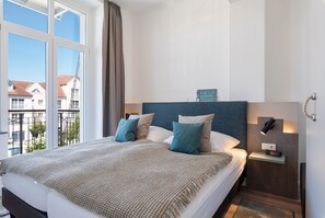 2 chambres, coffres-forts dans les chambres, Wi-Fi, draps fournis