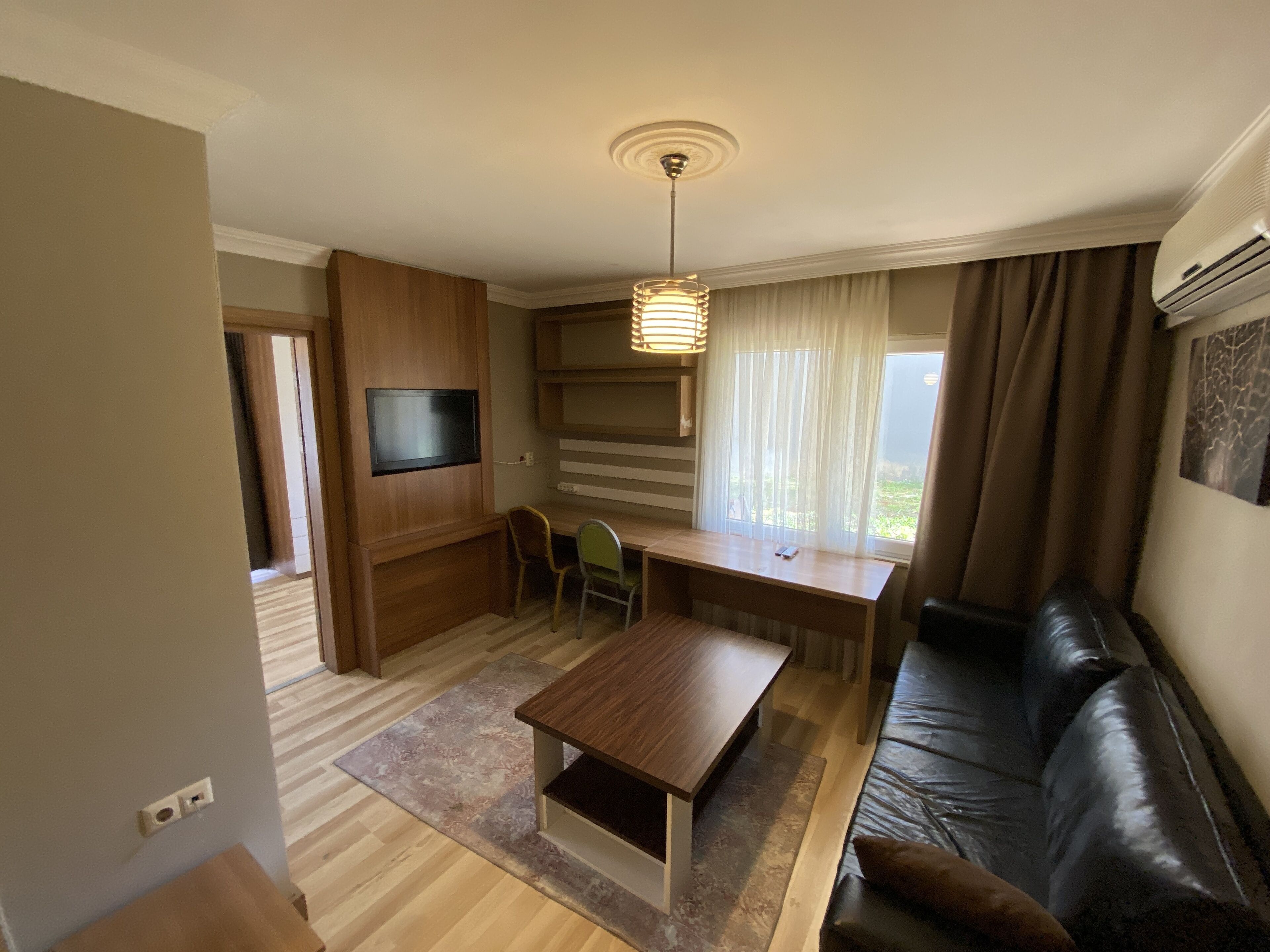 standard suite, 1 double bed, garden view | living area | 32-inch lcd tv with satellite channels, tv, heated floors