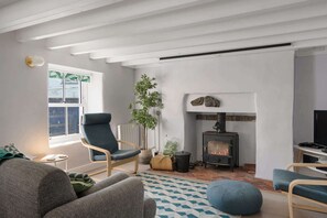 TV, fireplace, books, offices