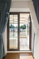 Deluxe Triple Room, Patio | Premium bedding, free WiFi, bed sheets