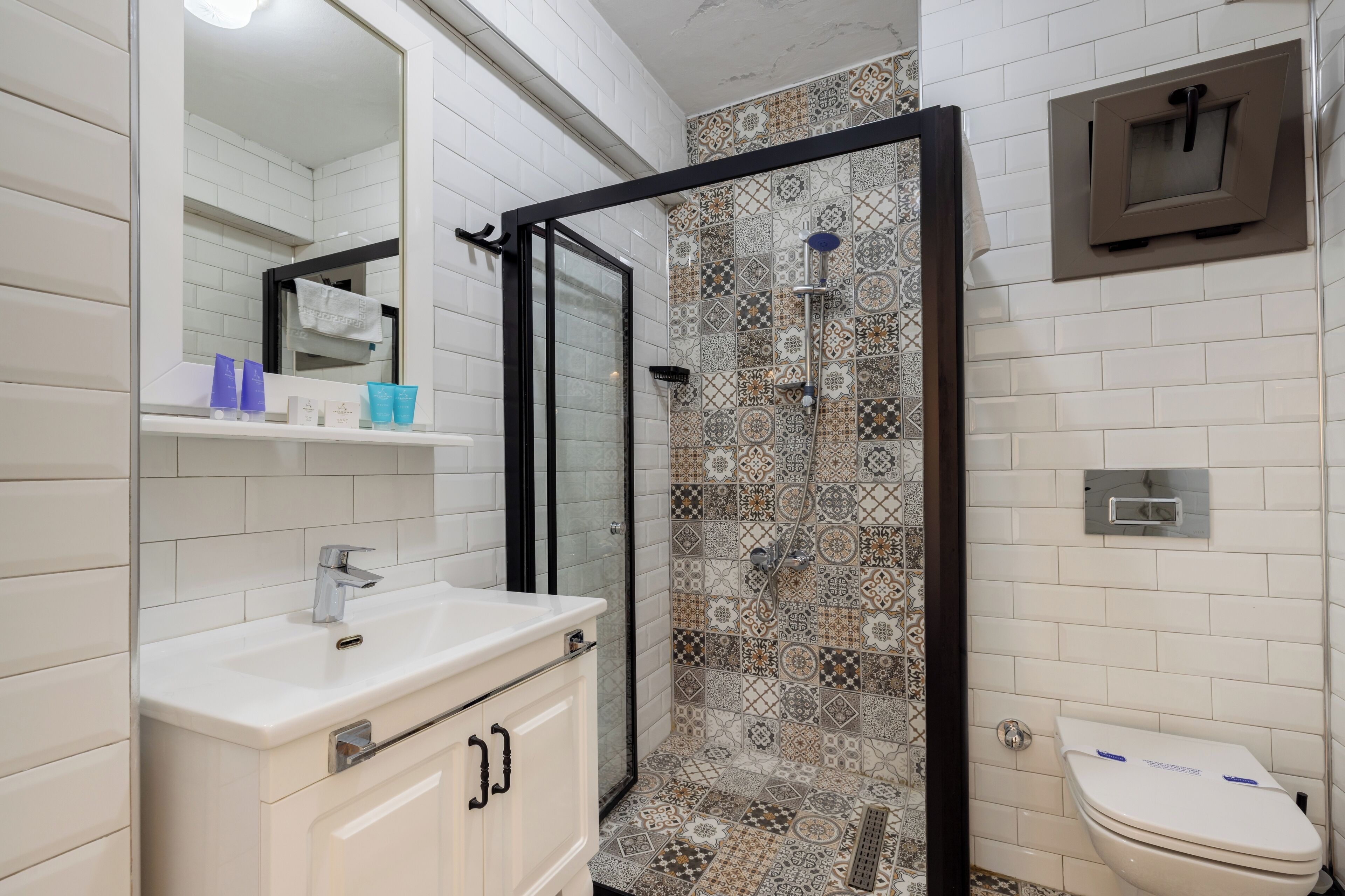 standard double room | bathroom | shower, hair dryer, towels, soap