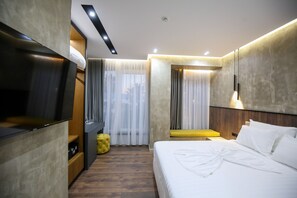 Ropa de cama de alta calidad y minibar