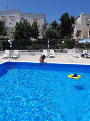 Seasonal outdoor pool, pool umbrellas, sun loungers