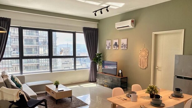 A modern living room with a sofa, coffee table, TV, dining table, and chairs. - ARTE PLUS - COZY & COMFORTABLE (PVT LIFT)  (Kuala Lumpur)