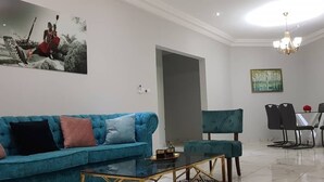 Comfort Apartment | Living area - SCI Le Logis (Yaoundé)