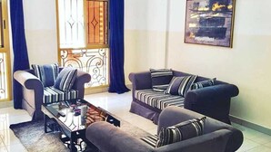 Comfort Apartment | Living area - SCI Le Logis (Yaoundé)