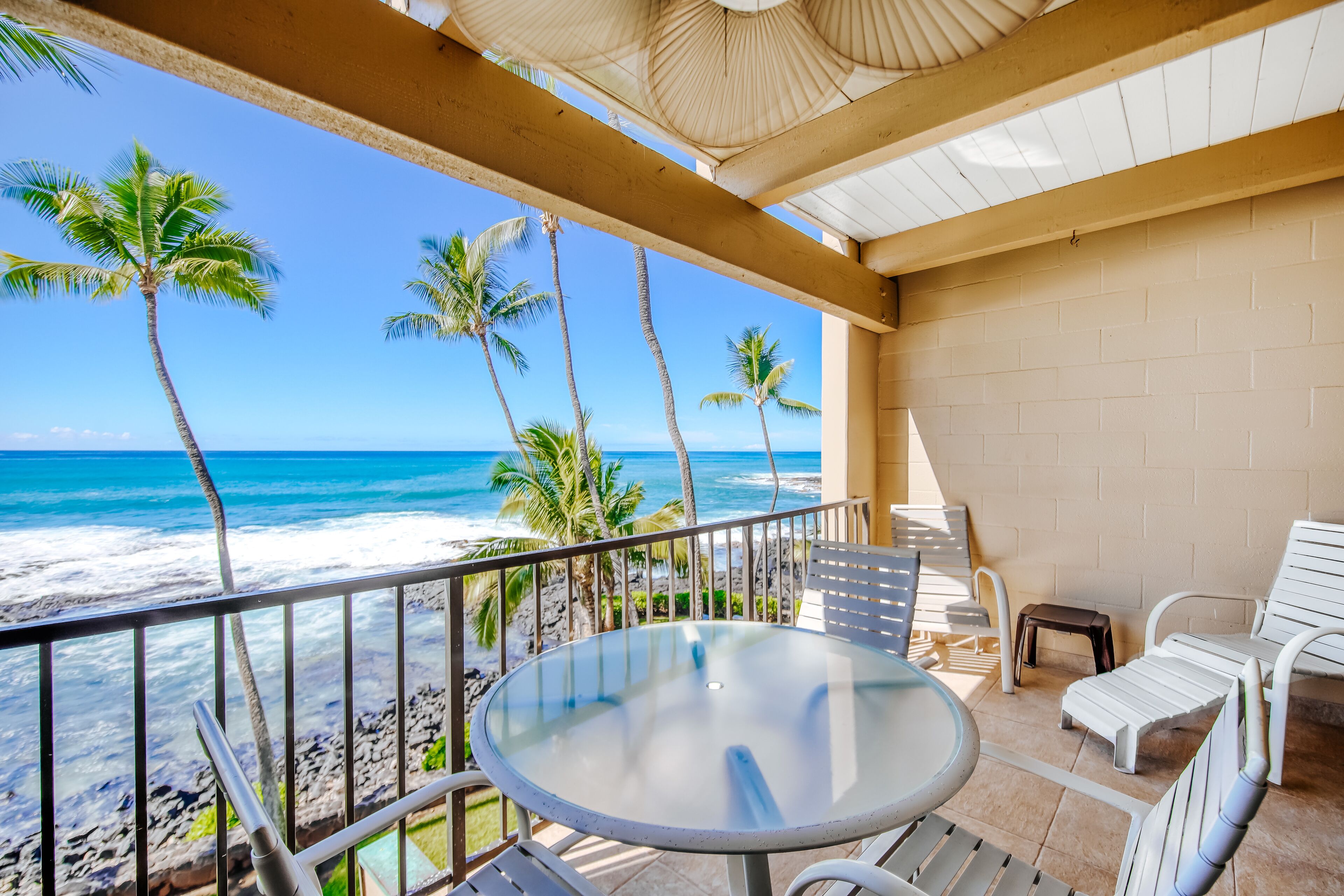 Breezy oceanfront condo with pool & hot tub - near shopping, dining & beaches